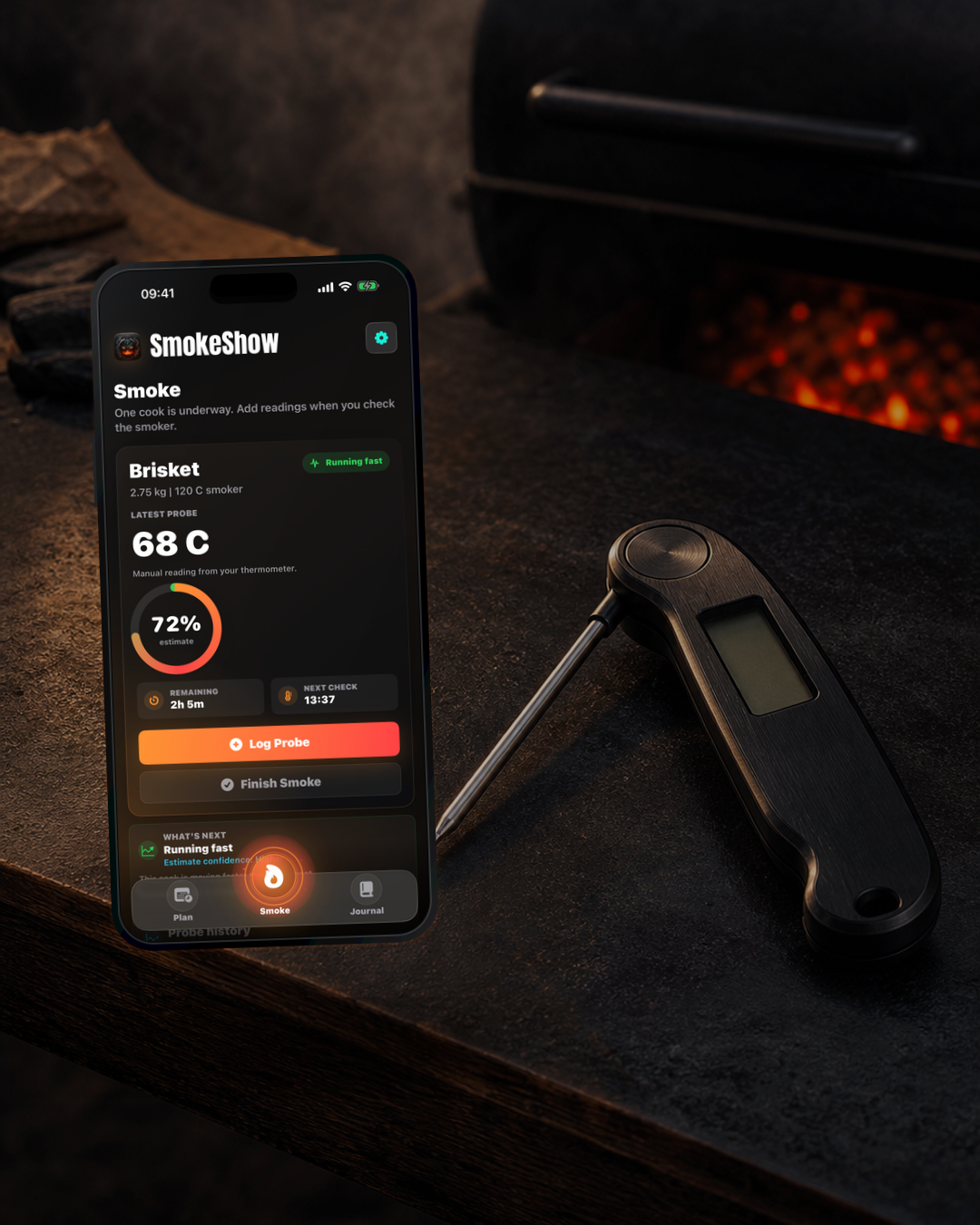 SmokeShow active Smoke screen beside a manual instant-read thermometer