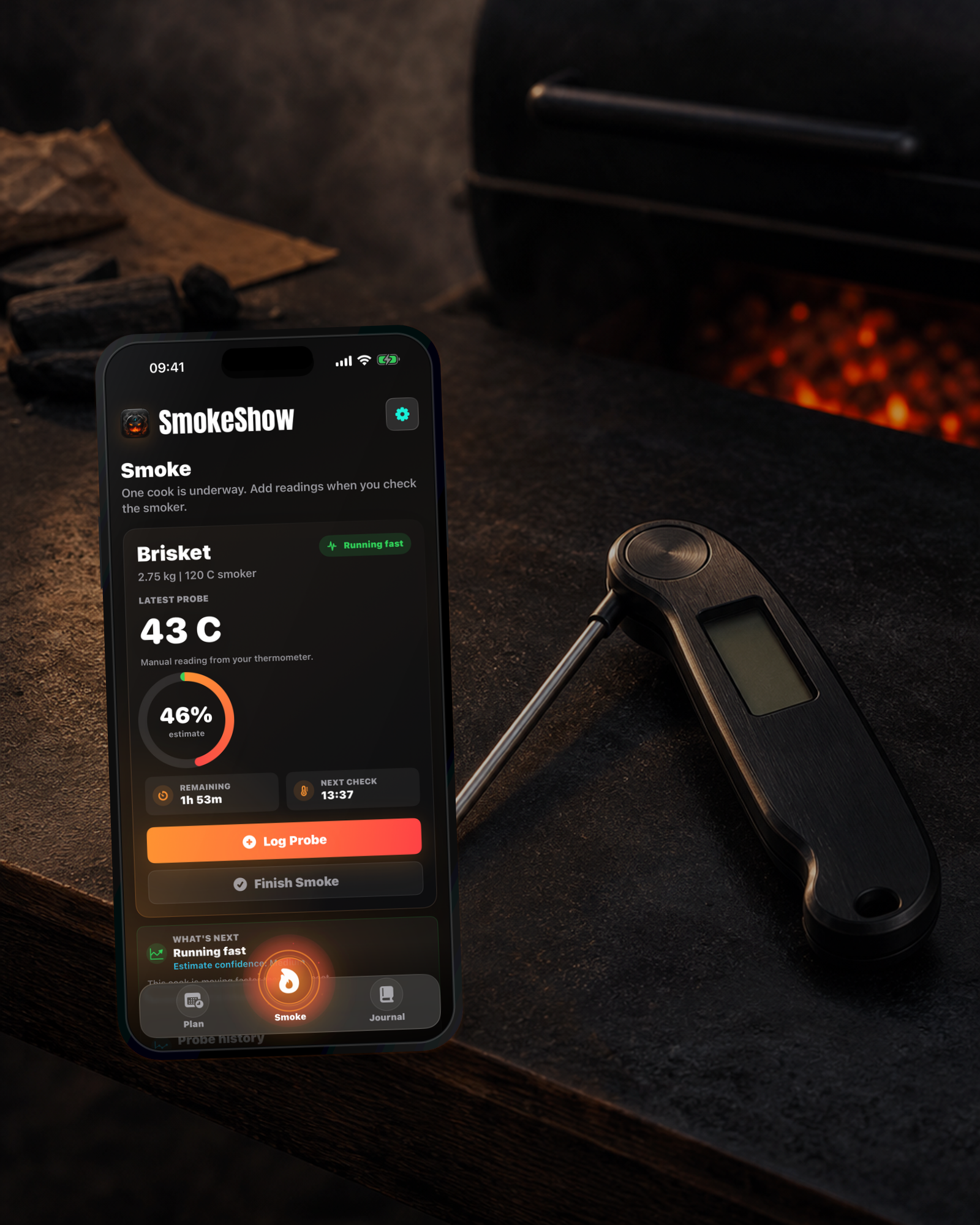 SmokeShow active Smoke screen beside a manual instant-read thermometer